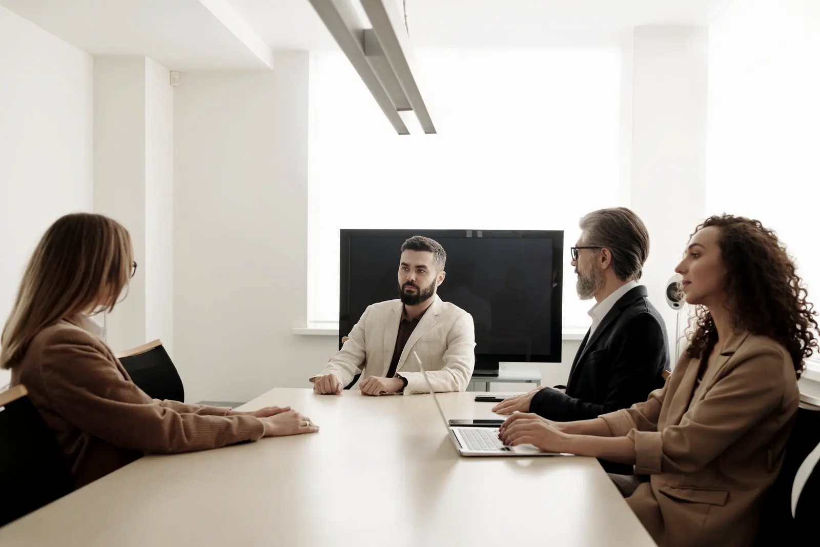 Partners in an investment committee meeting